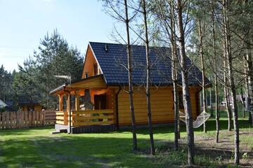 Фото номера Шале с двумя спальнями Шале Zacisze Leśne- Domek do wynajęcia г. Tereszpol Zaorenda 26